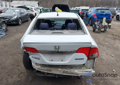 2009 Honda Civic Hybrid from USA, damaged, VIN JHMFA36239S013309